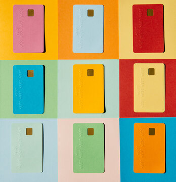 Colorful credit cards on colorful checked background