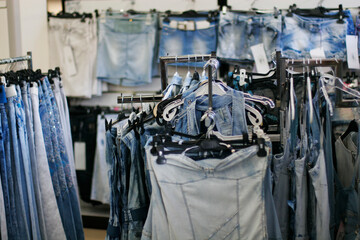 Row of hanged blue jeans