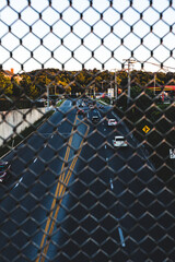 Town Seen from Chainlink Fence