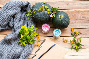 green pumpkin health care vegetation with notebook and knitting wool scarf of lifestyle woman relax autumn season arrangement flat lay style on background wooden