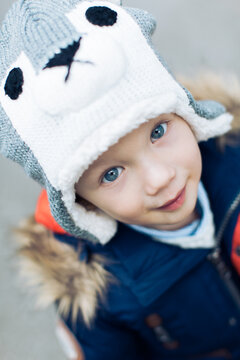 Charming young boy with big blue eyes