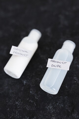 imitations and unfair competition, couple of body lotion bottles with Original vs Dupe product...