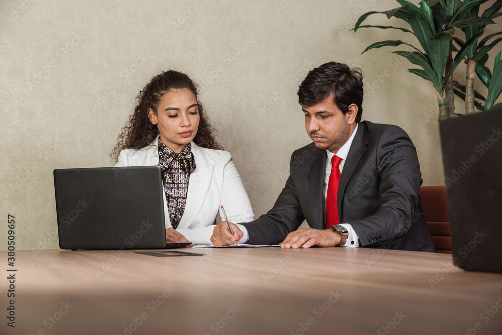 Wall mural business man and woman in meeting