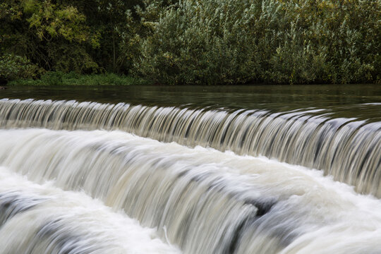 White water rushing over a weir