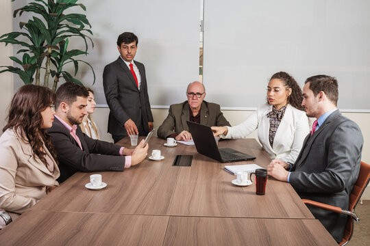 Latin People In Business Meeting In Office