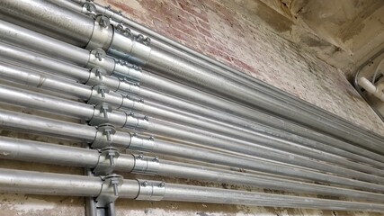 Electrical conduit and pipe in a commercial building.