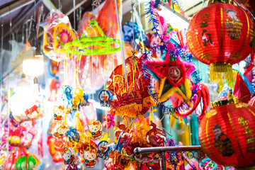 Decorated colorful lanterns hanging on a stand in the streets of Cholon in Ho Chi Minh City...