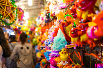 Decorated colorful lanterns hanging on a stand in the streets of Cholon in Ho Chi Minh City (Saigon), Vietnam during Mid Autumn Festival of Lunar Calendar.