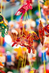 Decorated colorful lanterns hanging on a stand in the streets of Cholon in Ho Chi Minh City...