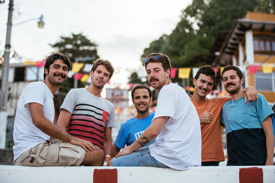 Group of young men hipster friends during a festivity in a local village of Chiapas, Mexico