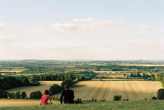 Father and son enjoying the view from Dragon Hill, Oxfordshire