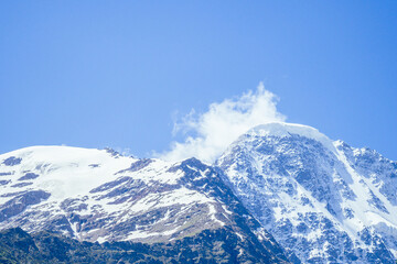 big Elbrus mountain in summe on cloudy day