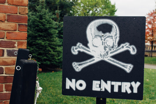 No entry sign next to an industrial building