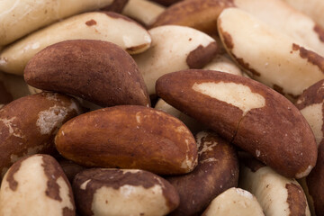 Brazil nuts close-up isolated on white background.