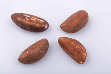Brazil nuts close-up isolated on white background.