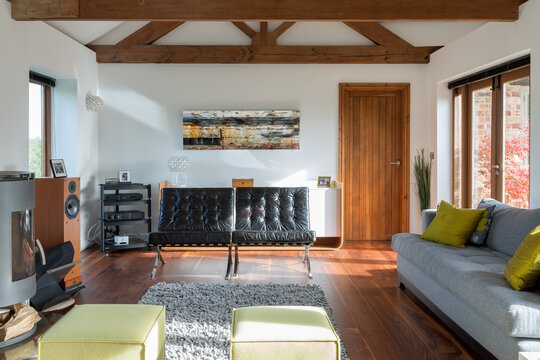 Modern living room part of a converted barn.