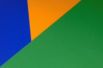 Color blocking background. Abstract geometric background.geometric pattern in orange, green and blue colors.stripes pattern.Paper Striped geometric background. paper abstract texture.
