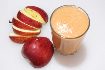 Fresh red apple juice isolated on white background
