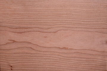 Horizontal wood texture of natural cherry board, background.