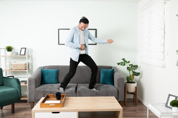 Latin man having fun at home