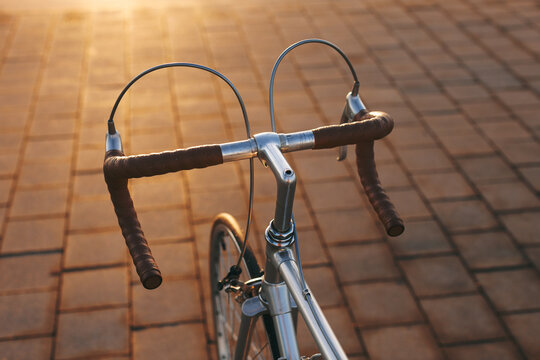 Leather handlebar in a vintage bicycle on the street.
