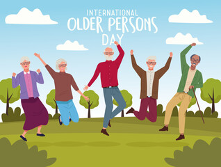 international older persons day lettering with old people jumping in the camp