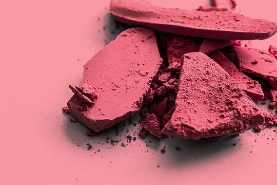 Red eye shadow powder as makeup palette closeup, crushed cosmetics and beauty textures