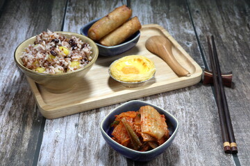 Kimchi, traditional spicy pickled vegetable in Korea style. Famous side dish menu in Asia restaurant. Selective focus concept. 