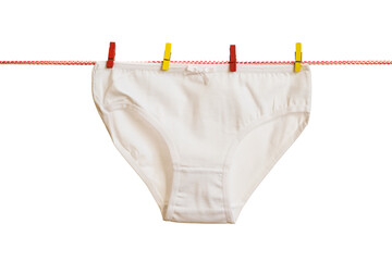 Women's panties with colorful clothespins on a clothesline. Isolated on a white background.