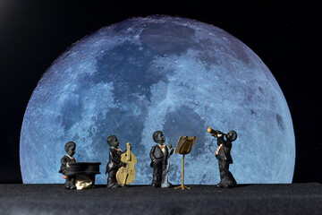 Obraz premium Music performance against a background of moon