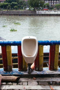 A urinal out in the open. A public toilet, literally.