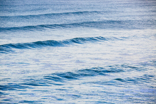 Small waves in the blue ocean sea