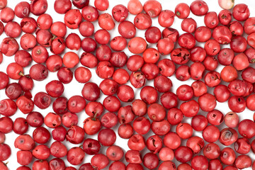Red peppers peas isolated on white, top view