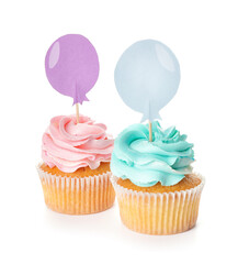 Tasty cupcakes with stylish toppers on white background