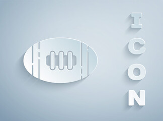 Paper cut American Football ball icon isolated on grey background. Rugby ball icon. Team sport game symbol. Paper art style. Vector Illustration.