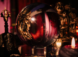 Clous up beautiful crystal orb in a fortune teller's room. Glass ball. Occult symbol