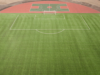 Football field and basketball playground from above.