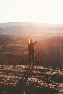 Woman looking the landscape at twilight
