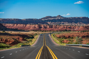 Highway road. Asphalt highways and mountains under the blue sky.