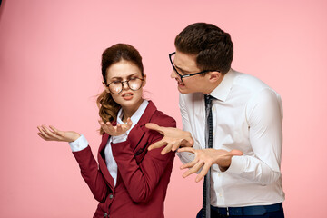 business man and woman office work colleagues team office management studio pink background