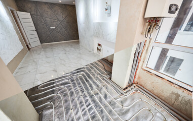 Comparison of new renovated apartment with marble floor and old place with underfloor heating...