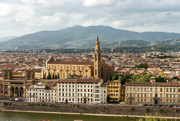 Obraz premium Cityscape of Florence with the Basilica of Santa Croce (Holy Cross), 1294-1385 and the River Arno. UNESCO world heritage site, Tuscany, Italy, Europe.