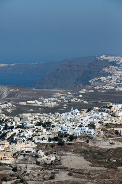 Aerial view of Santorini looking over Karterados and Thera with Oia in the background.