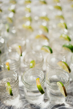 Mason jar glasses of water with lime