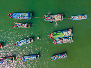 Vietnamese boats on the river. River pollution