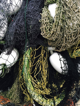 Close up of piles of commercial fishing nets