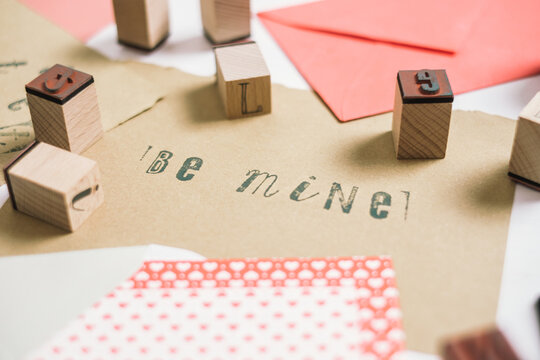 Be Mine"" Written with Stamps on the Valentine's Day Card