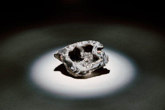 Broken Open Quartz Rock Illuminated By Spotlight