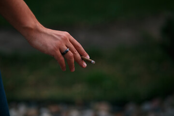harm of Smoking, cigarette in hand