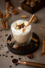 caffe latte with whipped cream, cinnamon and anise